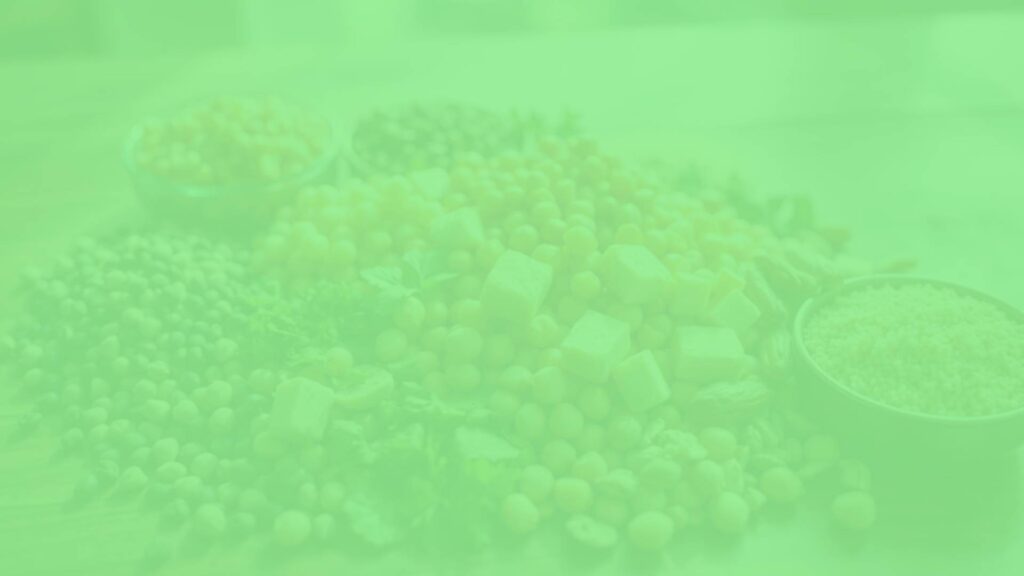 A vibrant assortment of plant-based protein sources including lentils, chickpeas, tofu, quinoa, and nuts, arranged neatly on a wooden table, natural sunlight, realistic.