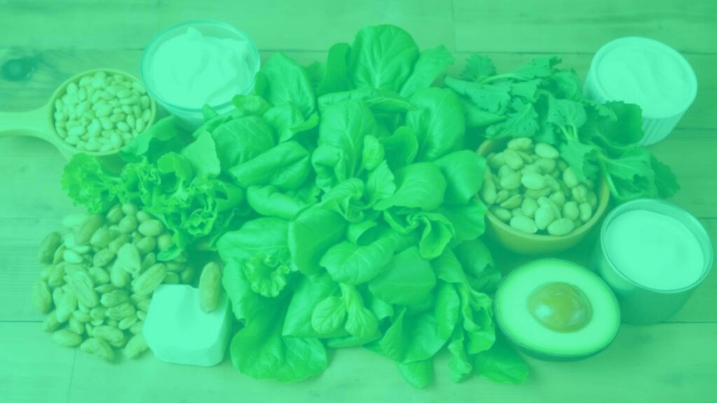 A vibrant assortment of vegetarian vitamin B2-rich foods, including leafy greens, nuts, and dairy alternatives, arranged neatly on a wooden table, bright and healthy, realistic.