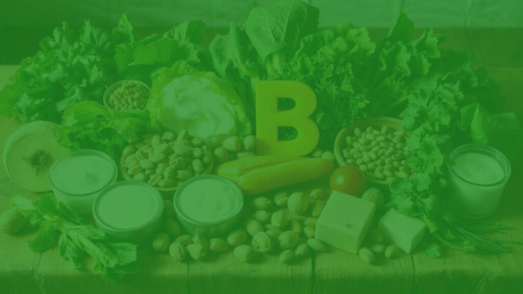 A colorful assortment of vitamin B-rich foods including leafy greens, nuts, and dairy products, arranged neatly on a wooden table, soft natural lighting, realistic.